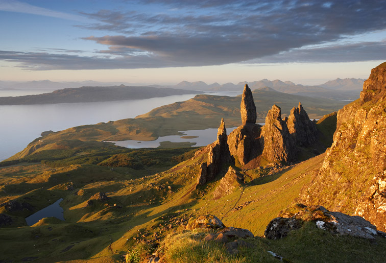 Old Man of Storr with Isle of Raasay and Cuillin mountains beyond. Isle of Skye. Scotland. June.